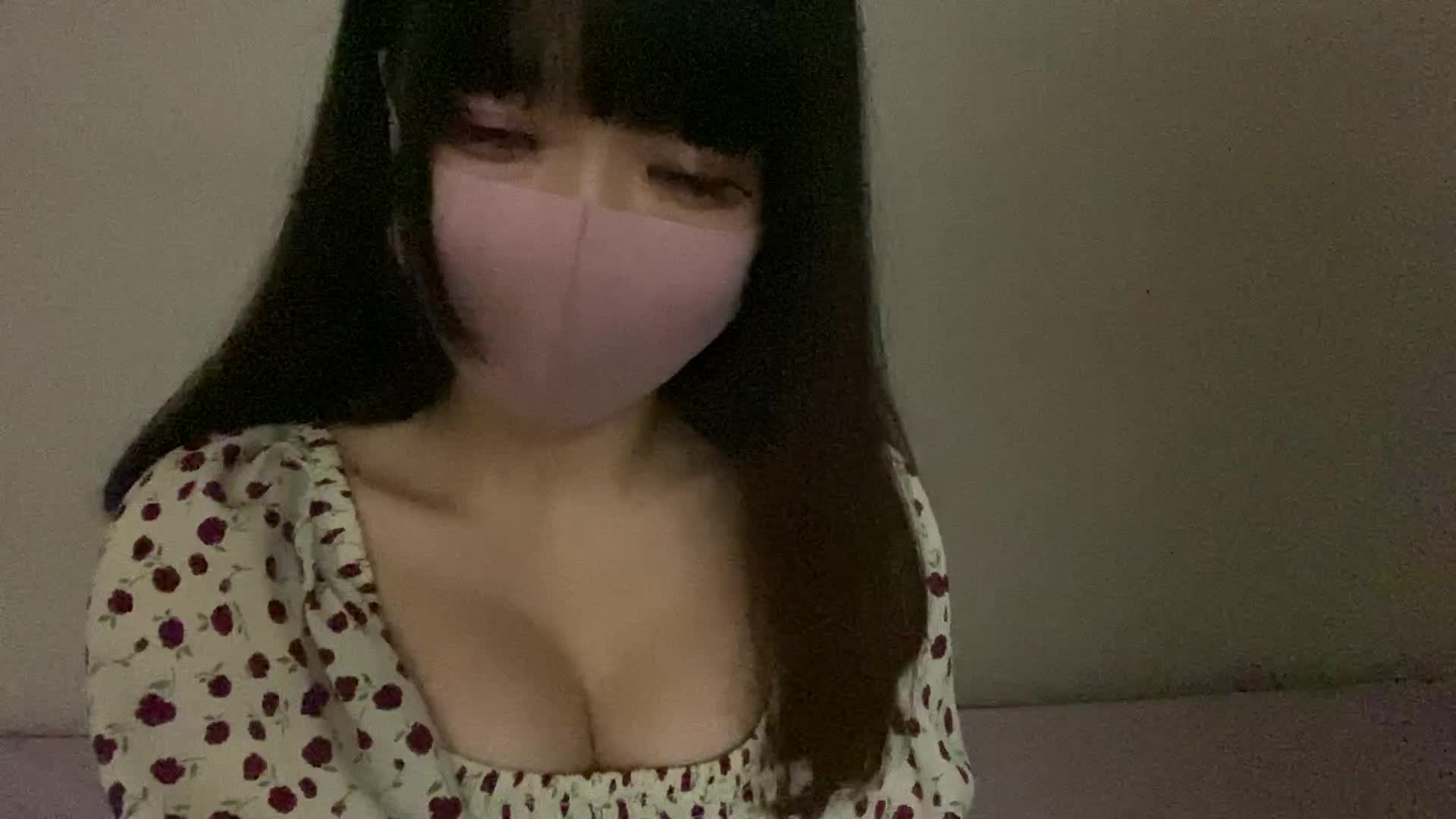 Beautiful Asian teasing and playing with her nipples